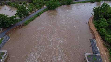 Aerial View Of Water Released From The Drainage Channel Of The Concrete