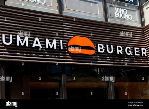 Umami Burger signboard on display outside its new restaurant in Aoyama ...