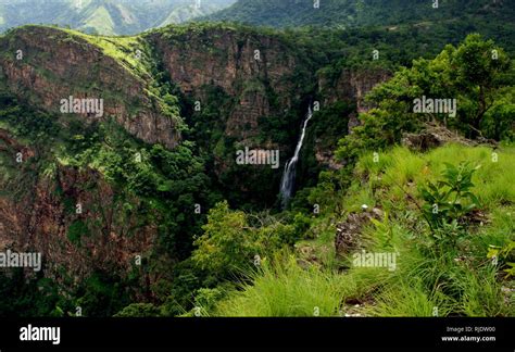 Stunning Wli waterfalls surrounded by lush jungle and mountains in ...