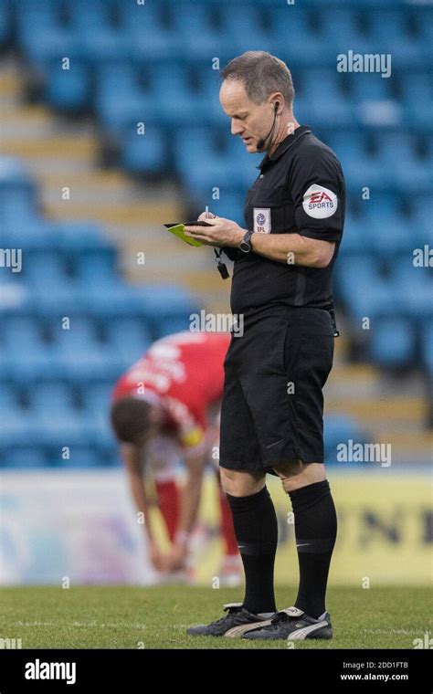 Robert Lewis (Referee) writing in his book Stock Photo - Alamy