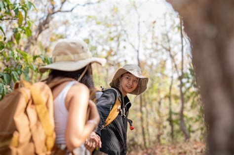 Lovely Couple Lesbian Woman With Backpack Hiking In Nature Loving Lgbt Romantic Moment In