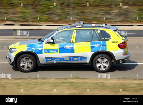 Police Car Driving Near London Heathrow Airport Uk Stock Photo