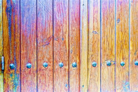 Antique Wooden Door With Iron Hinges And Nails Faded Brown Boards