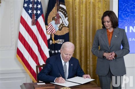 Photo President Joe Biden Signs Executive Order On Artifical