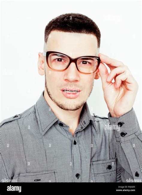 Young Handsome Teenage Hipster Guy Posing Emotional Wearing Glasses