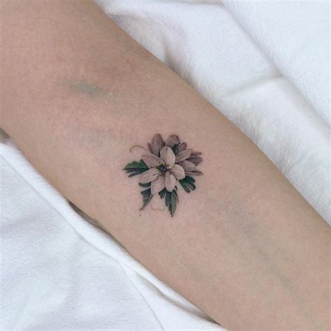 Share 77+ tiny flower tattoos - in.coedo.com.vn