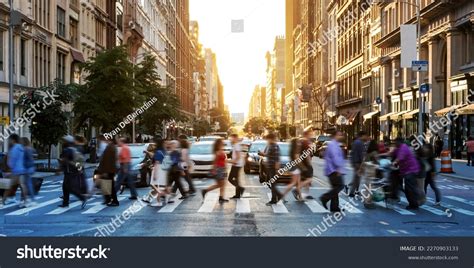 Crowds People Walking Across Busy Crosswalk Stock Photo