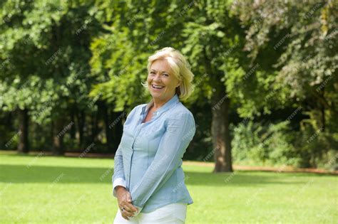 Premium Photo Happy Older Woman Smiling Outdoors