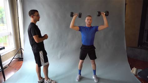 How To Perform The Dumbbell Front Squat To Shoulder Press Exercise Youtube