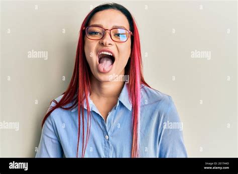 Young Caucasian Woman Wearing Casual Clothes And Glasses Sticking