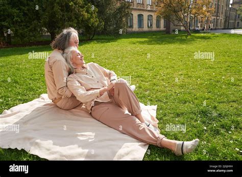Relaxed Mature People Lying On The Plaid Stock Photo Alamy