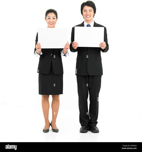 A Businessman And A Businesswoman With Boards Stock Photo Alamy