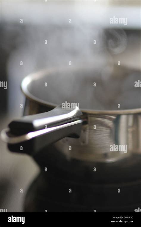 A pot of boiling water Stock Photo - Alamy