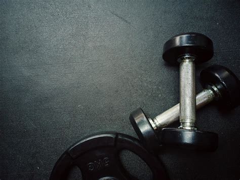 Gym Equipment On Dark Floor Background 11414112 Stock Photo At Vecteezy