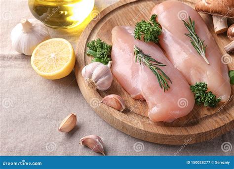 Raw Chicken Fillet With Herbs On Wooden Board Stock Image Image Of