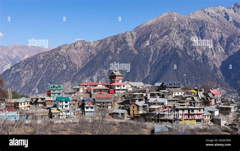 INDIA, HIMACHAL PRADESH, KINNAUR, December 2022, Villagers at Kalpa Village with Kinnaur Kailash ...