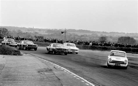 Jim Clark Drifting His Lotus Cortina At Snetterton In 1966 As The Pack