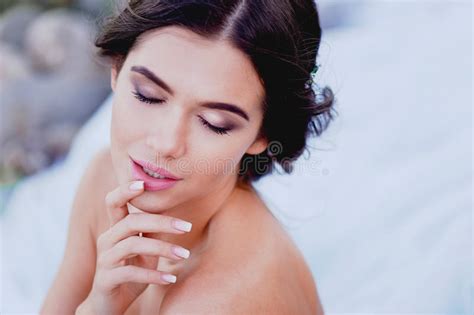 Brunette With Closed Eyes Touches Her Lips Stock Photo Image Of Beauty Curled