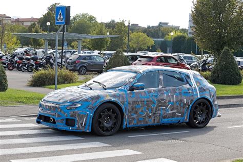 Ferrari Ev Chassis Mule Spied Flaunting Maserati Levante Bodywork