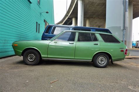 Seattle's Parked Cars: 1975 Datsun 710 Wagon