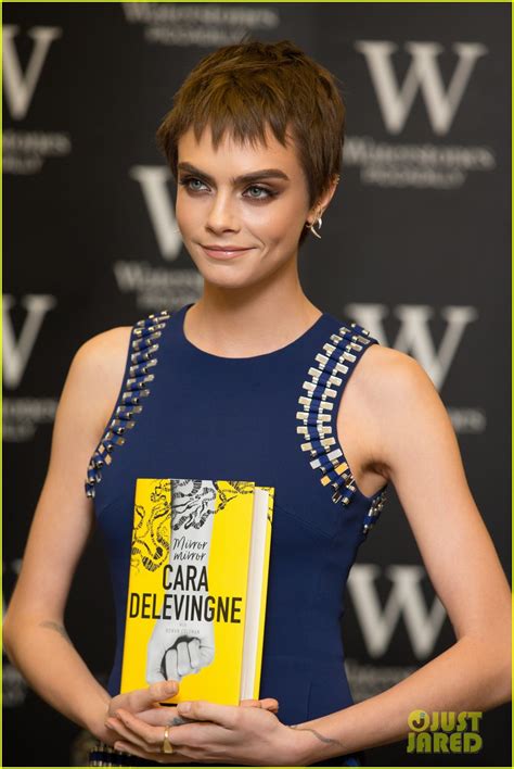 Cara Delevingne Debuts New Brunette Locks At Book Signing Photo