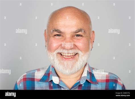Happy Old Mature Man Smiling Portrait Happy Elderly Man On Gray