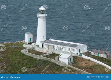 Aerial View Of The Historic South Stack Lighthouse On The Shore Of Holy