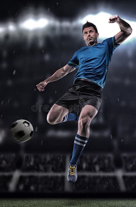 Soccer Player In Action On A Dark Background Stock Photo Image Of