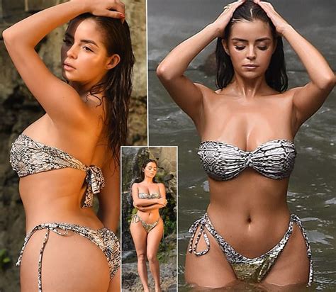 Demi Rose Shows Off Her Famous Curves In A Tiny Snakeskin Bikini During