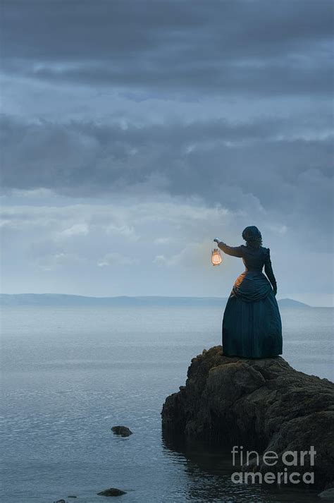 Victorian Woman Holding An Oil Lamp Facing The Sea Photograph By Lee