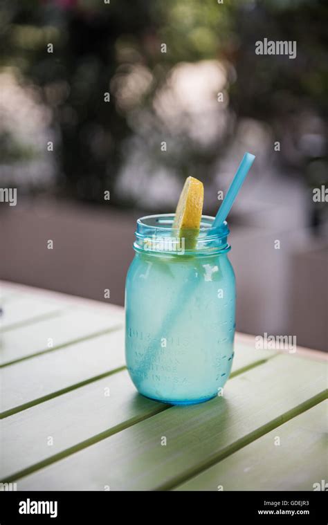 Glass Of Lemon Water With Drinking Straw Stock Photo Alamy