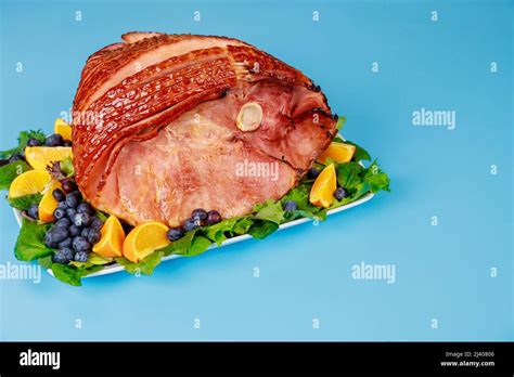 Spiral Sliced Hickory Smoked Ham With Fresh Orange And Blueberries