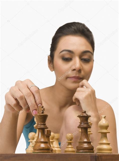 Woman Playing Chess Stock Photo By Imagedb Seller