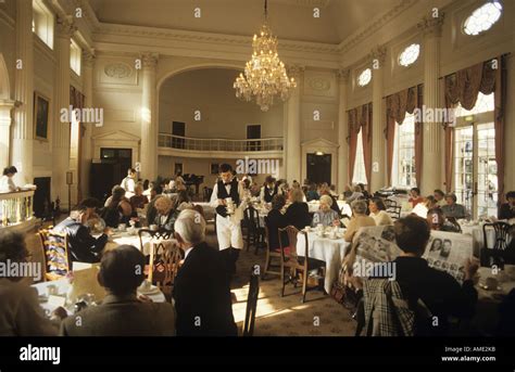 People Taking Afternoon Tea Inside The Pump Room Built During The Late