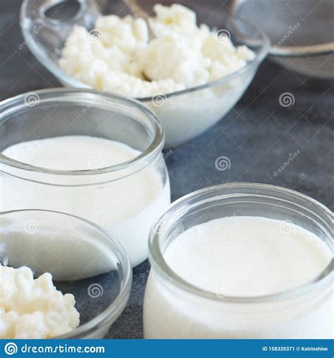 Fermented Drink Kefir in Small Bottles and Kefir Grains Stock Image ...