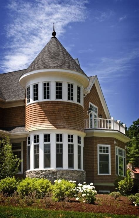 Oval Window Shingle Style Home