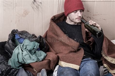 Homeless Drinking Cheap Wine Stock Photo Image Of Miserable