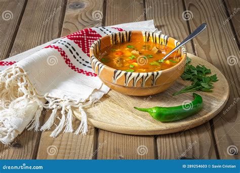 Romanian Traditional Beef Soup Served In Clay Bowl In Romanian Is