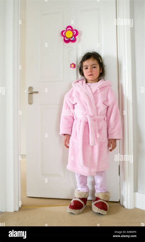 Sick Child Stands Outside Bedroom Door Wearing Gown Stock Photo Alamy