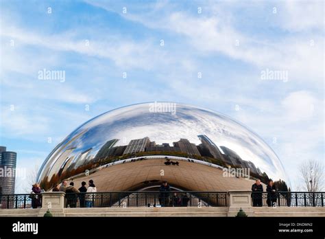 Cloud Gate Also Known As The Bean With Chicagos Skyline Reflected In