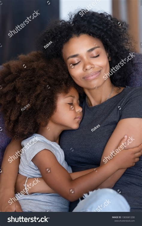 Black Woman With Daughter Hugging At Home Images Photos Et