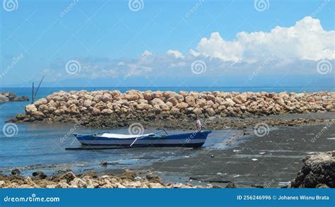 A Traditional Blue Boat In A Sulawesi Fishing Village Stock Photo