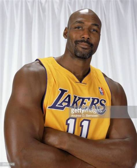 Karl Malone of the Los Angeles Lakers poses for a portrait during the ...