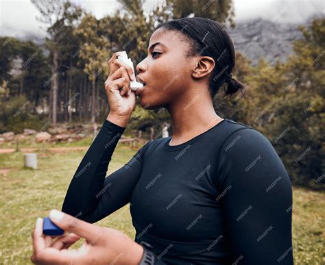 Premium Photo | Black woman breathe or asthma pump outdoor in park for