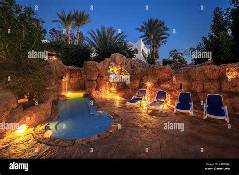 Evening view for luxury swimming pool in night illumination Stock Photo ...