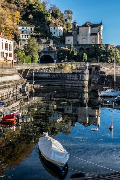 Premium Photo Church That Is Reflecting In The Lake Maggiore In Maccagno