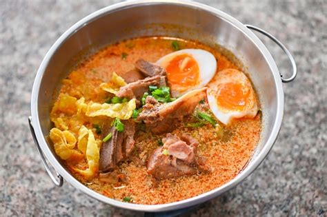 Premium Photo Curry Bone Soup Pork Bone Soup With Boiled Eggs In Hot Pot Thai Food Tom Yum Hot