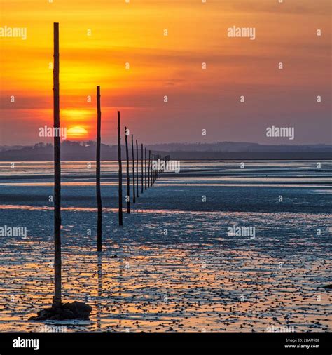 Coast lindisfarne causeway hi-res stock photography and images - Alamy