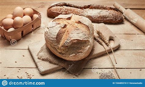 Freshly Baked Bread Loaf Of Bread On Wooden Background Food Closeup Bread At Leaven