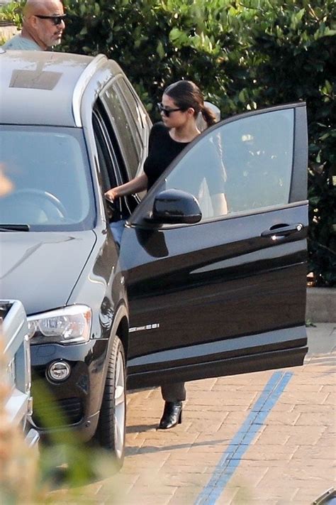 Selena Gomez In Satin Cargo Pants And A Black Blouse 10 12 2019